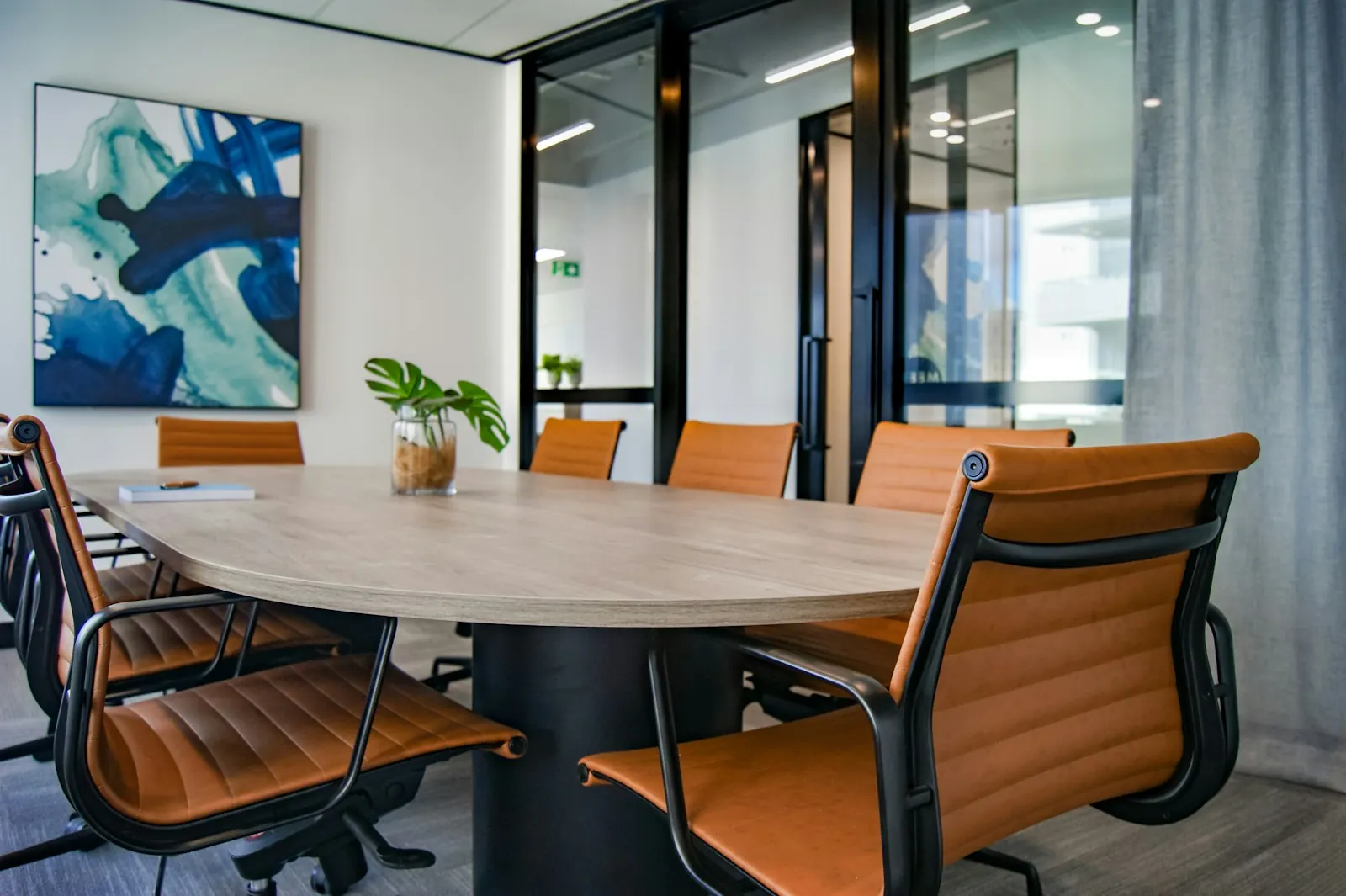 Empty conference room table and chairs ready for a board meeting